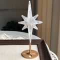 Clear quartz North Star on Metal Stand