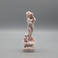 Statute of Aphrodite and cupid a top a claw shell carved from pink opal