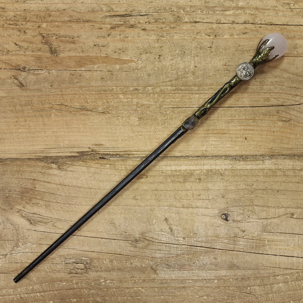 Black wooden magic wand with taurus symbol