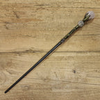 Black wooden magic wand with taurus symbol