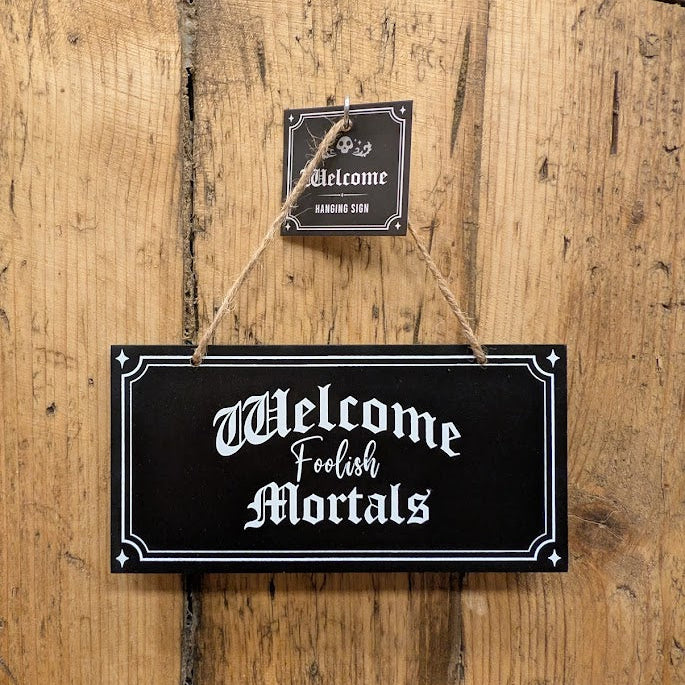 Welcome Foolish Mortals Hanging Sign