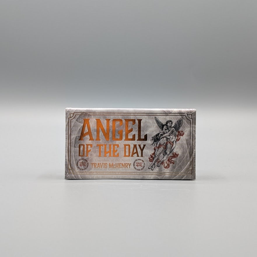 Affirmation cards titled 'Angel of the Day' by Travis McHenry on a gray background