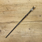 Black wooden magic wand with virgo symbol