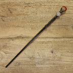 Black wooden magic wand with aries sign