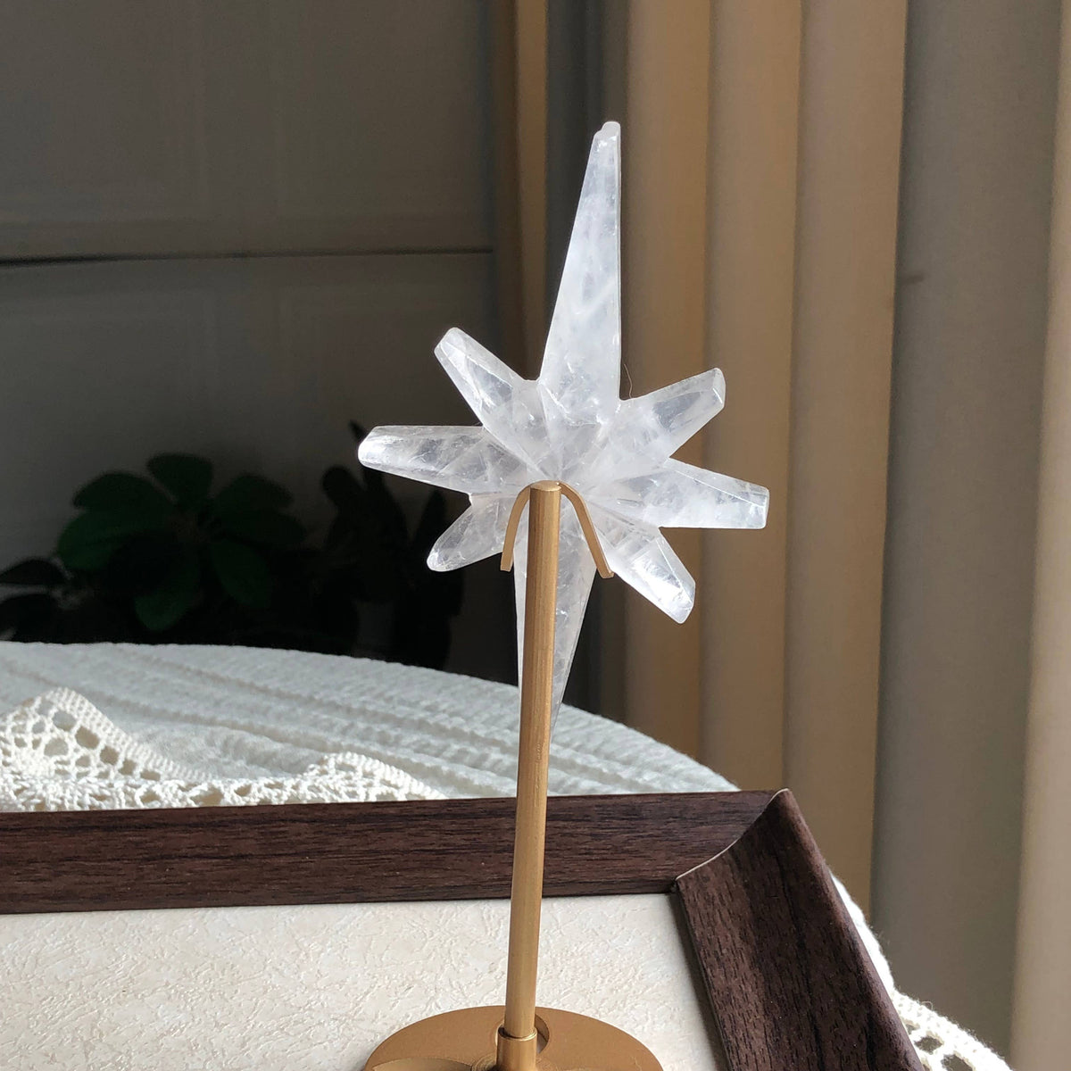 Clear quartz North Star on Metal Stand