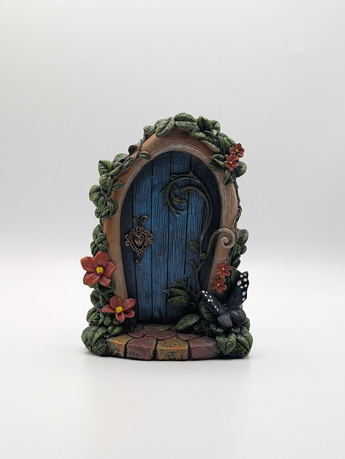 Fairy door with floral decorations