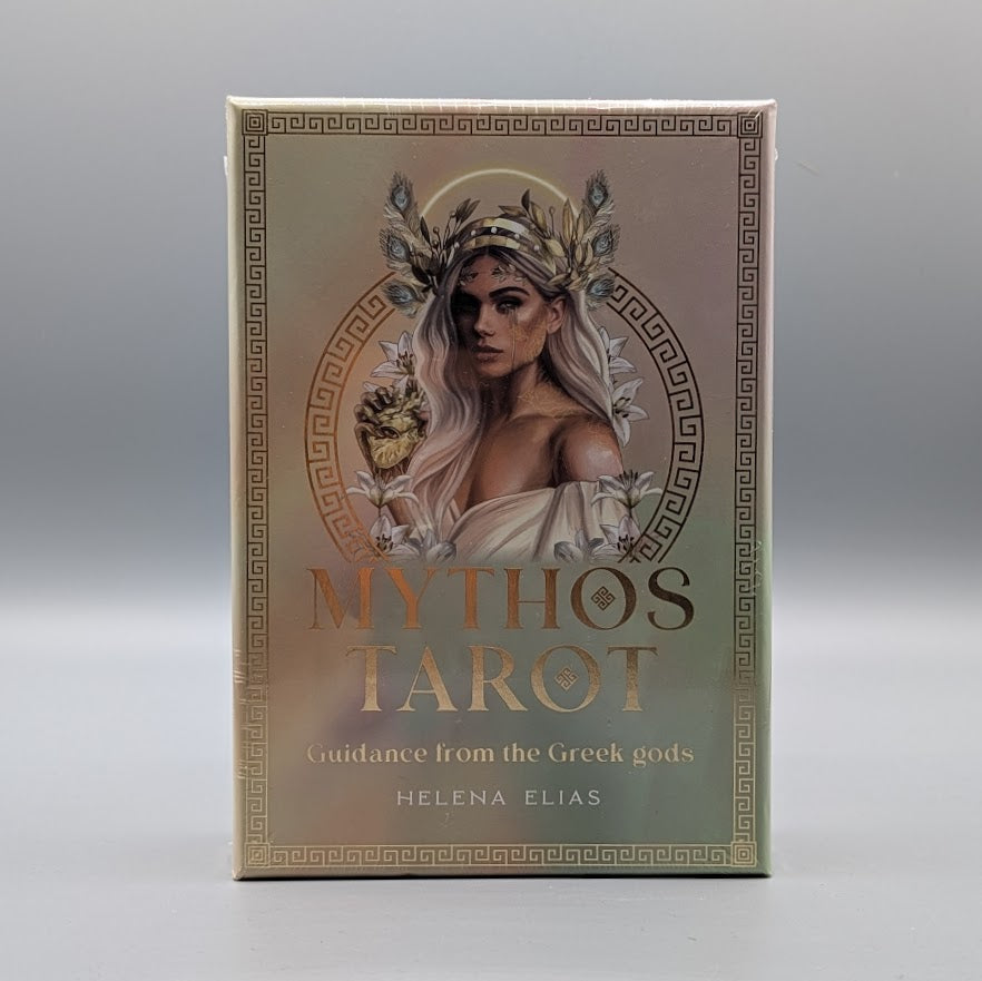 Box of Mythos Tarot with a woman's face and decorative elements