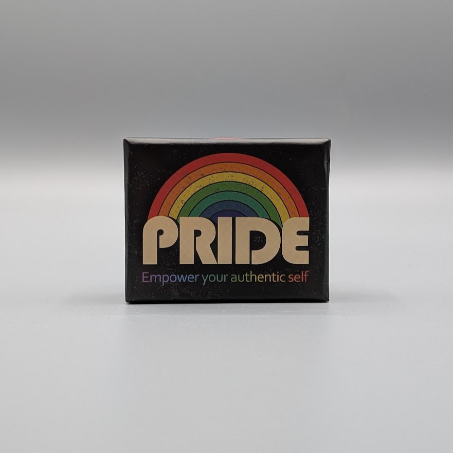 Black box with rainbow design and 'PRIDE Empower your authentic self' text on a gray background