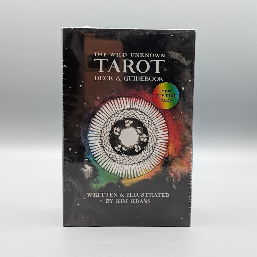 The wild unknown tarot deck and guidebook with abstract design and text